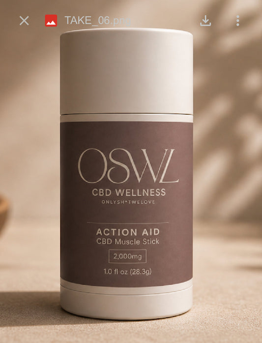 OSWL Action Aid CBD Muscle Stick 2000mg — twist-up container on warm sand surface